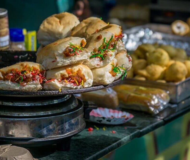 Image of vada-pav on a stall, being used in the blog of best indian street food in hamilton.