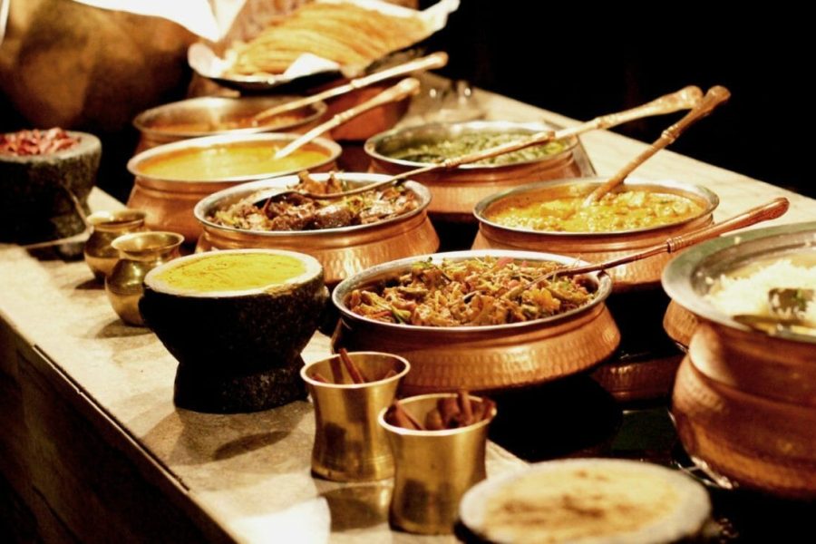Colorful spread of Indian dishes at BarShala, top Indian dining spot in Hamilton
