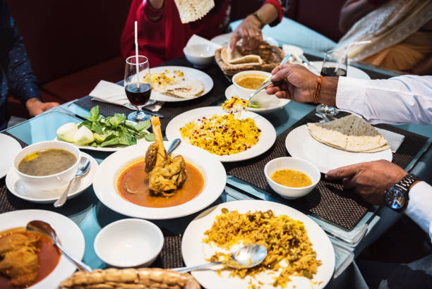 family enjoying their food thus proving that barshala is a familty friendly indian restaurant in hamilton 