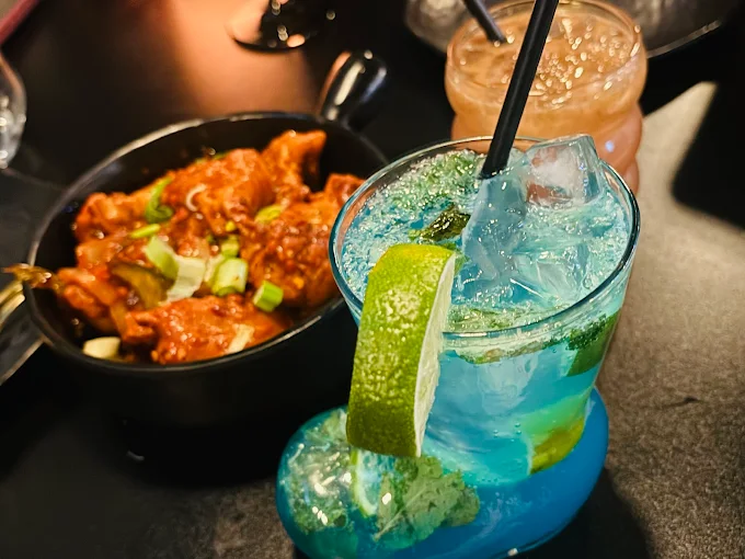 Enjoying Butter chicken and Masala Mojito at barshala which is one of the top bars in hamilton
