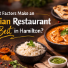 Authentic Indian food including curry, rice and naan shown for article about best Indian restaurant in Hamilton.